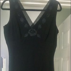Casual Corner size 10 black sleeveless dress-sheer overlay on upper with flaw.